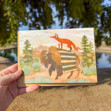 fox and bison roam the desert card